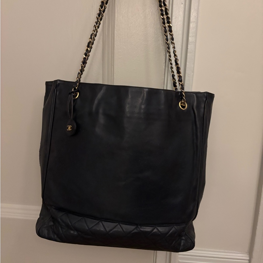 I am selling a Navy Blue Chanel tote bag. It is in very good condition.